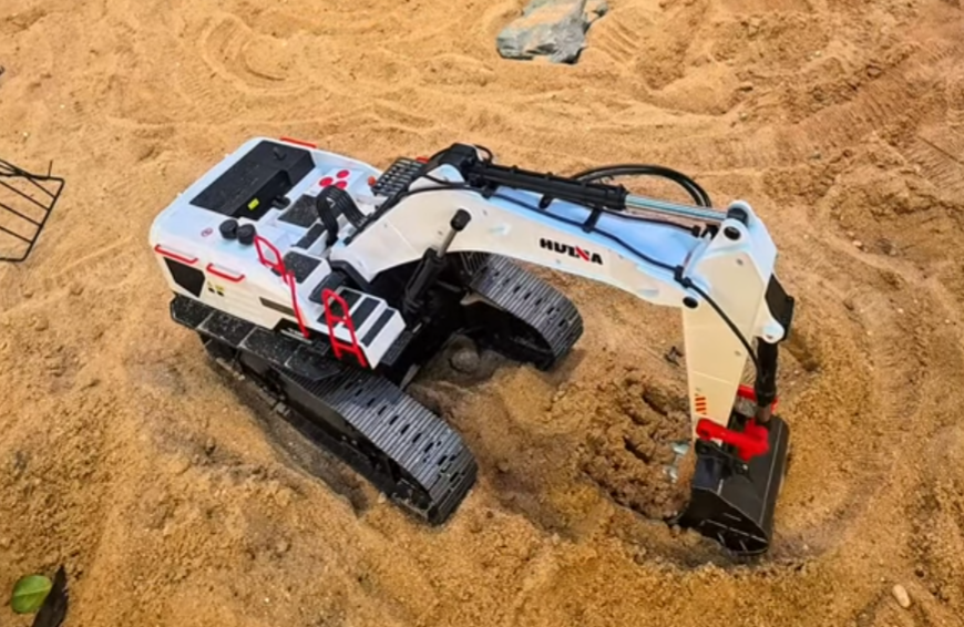 Excavator in sand pit